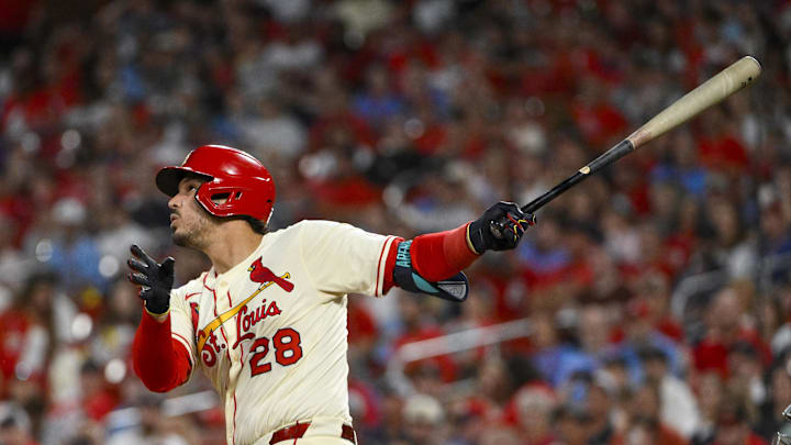 Sep 20, 2025; St. Louis, Missouri, USA; St. Louis Cardinals third baseman Nolan Arenado (28) hits a one run single against the Milwaukee Brewers during the fourth inning at Busch Stadium. Mandatory Credit: Jeff Curry-Imagn Images