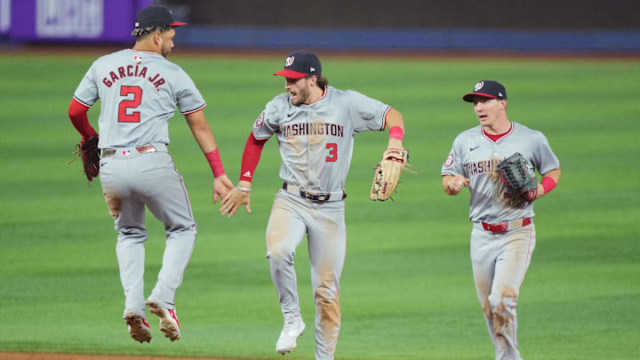 Sep 3, 2024; Miami, Florida, USA; Washington Nationals right fielder Dylan Crews (3) celebrates a victory over the Miami Marlins with second baseman Luis García Jr. (2) and center fielder Jacob Young, right, at loanDepot Park. Sep 3, 2024; Miami, Florida, USA; Washington Nationals right fielder Dylan Crews (3) celebrates a victory over the Miami Marlins with second baseman Luis García Jr. (2) and center fielder Jacob Young, right, at loanDepot Park.