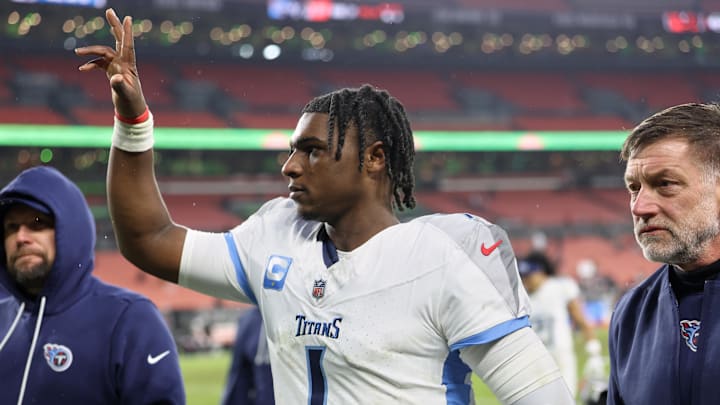 Dec 7, 2025; Cleveland, Ohio, USA; Tennessee Titans quarterback Cam Ward (1) acknowledges the crowd after the game against the Cleveland Browns at Huntington Bank Field. Mandatory Credit: Scott Galvin-Imagn Images