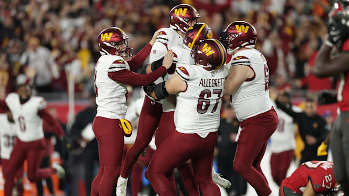 Jan 12, 2025; Tampa, Florida, USA; Washington Commanders place kicker Zane Gonzalez (47) celebrates with teammates after kicking the game-wining field goal during the fourth quarter of a NFC wild card playoff against the Tampa Bay Buccaneers at Raymond James Stadium. Mandatory Credit: Nathan Ray Seebeck-Imagn Images