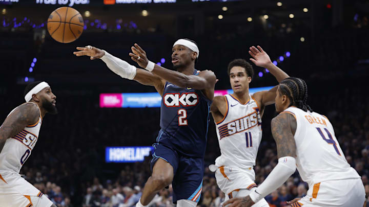 Apr 22, 2026; Oklahoma City, Oklahoma, USA; Oklahoma City Thunder guard Shai Gilgeous-Alexander (2) passes against the Phoenix Suns in the second half during game two of the first round of the 2026 NBA Playoffs at Paycom Center. Mandatory Credit: Alonzo Adams-Imagn Images
