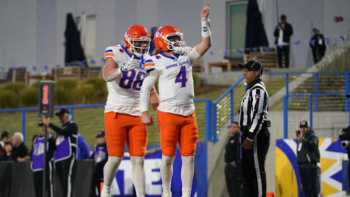 Boise State Broncos quarterback Maddux Madsen (4) celebrates next to tight end Matt Wagner. Boise State Broncos quarterback Maddux Madsen (4) celebrates next to tight end Matt Wagner.