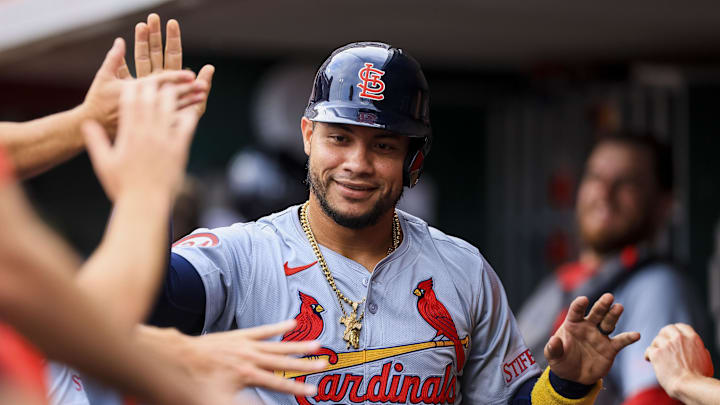Aug 12, 2024; Cincinnati, Ohio, USA; St. Louis Cardinals designated hitter Willson Contreras (40) high fives teammates after scoring on a RBI single hit by third baseman Nolan Arenado (not pictured) in the third inning at Great American Ball Park. Mandatory Credit: Katie Stratman-Imagn Images Aug 12, 2024; Cincinnati, Ohio, USA; St. Louis Cardinals designated hitter Willson Contreras (40) high fives teammates after scoring on a RBI single hit by third baseman Nolan Arenado (not pictured) in the third inning at Great American Ball Park. Mandatory Credit: Katie Stratman-Imagn Images