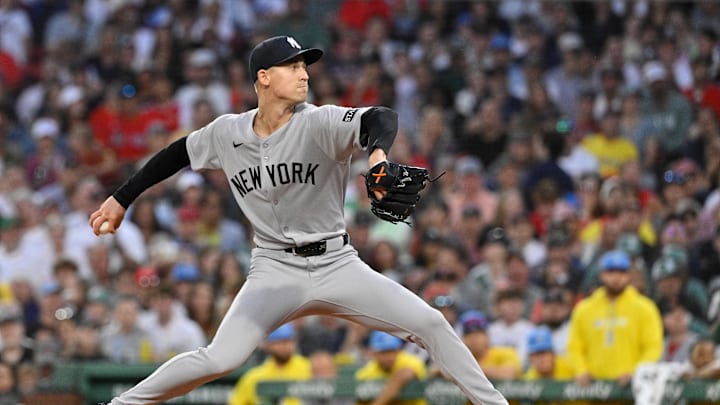 Sep 13, 2025; Boston, Massachusetts, USA; New York Yankees relief pitcher Luke Weaver (30) pitches against the Boston Red Sox during sixth inning  at Fenway Park. Mandatory Credit: Eric Canha-Imagn Images