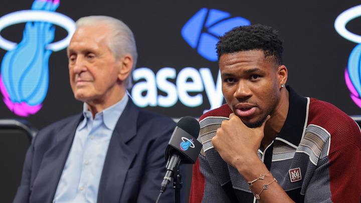 Giannis Antetokounmpo speaking next to Pat Riley | Mandatory Credit: Sam Navarro