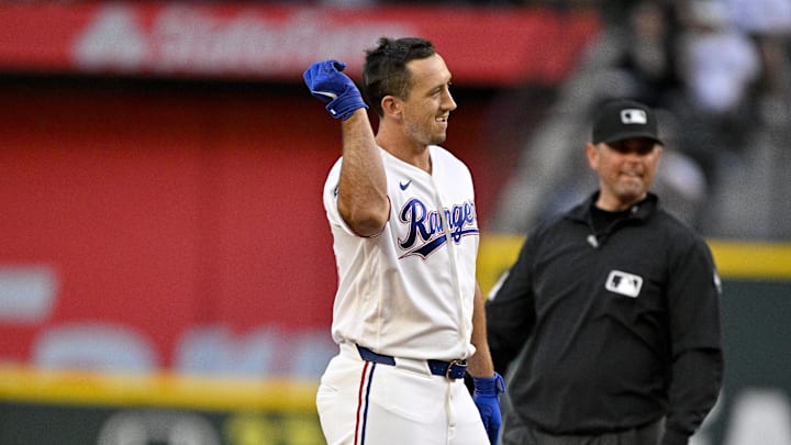 Apr 6, 2026; Arlington, Texas, USA; Texas Rangers left fielder Wyatt Langford (36) hits a double against the Seattle Mariners during the first inning at Globe Life Field. Mandatory Credit: Jerome Miron-Imagn Images