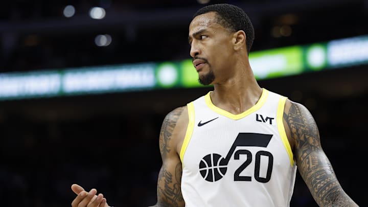 Dec 19, 2024; Detroit, Michigan, USA;  Utah Jazz forward John Collins (20) reacts in the first half against the Detroit Pistons at Little Caesars Arena. Mandatory Credit: Rick Osentoski-Imagn Images