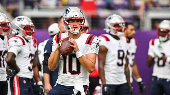 Aug 16, 2025; Minneapolis, Minnesota, USA;  New England Patriots quarterback Drake Maye (10) warms up before the game against the Minnesota Vikings at U.S. Bank Stadium. Mandatory Credit: Jeffrey Becker-Imagn Images