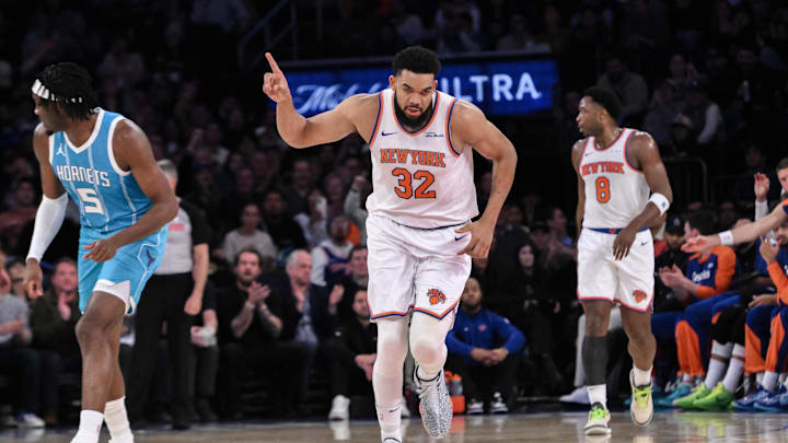 Dec 5, 2024; New York, New York, USA; New York Knicks center Karl-Anthony Towns (32) reacts during the first half against the Charlotte Hornets at Madison Square Garden. Mandatory Credit: John Jones-Imagn Images