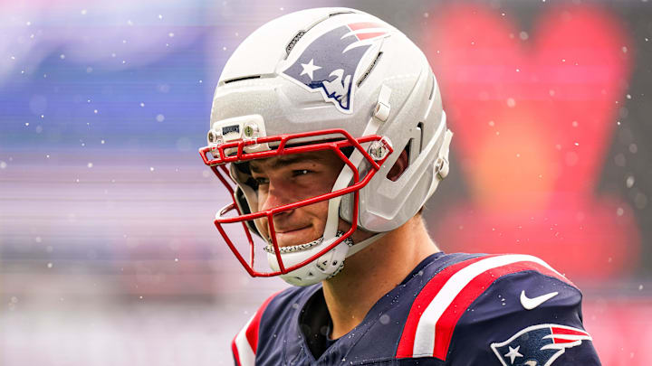 Dec 14, 2025; Foxborough, Massachusetts, USA; New England Patriots quarterback Drake Maye (10) warms up before the start of the game against the Buffalo Bills at Gillette Stadium. Mandatory Credit: David Butler II-Imagn Images