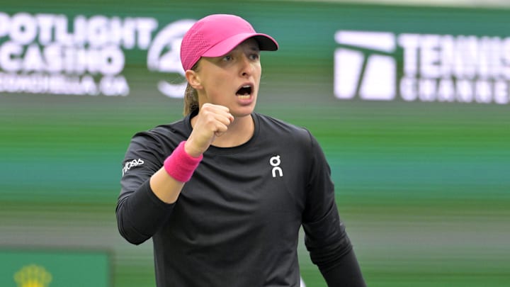 Mar 15, 2024; Indian Wells, CA, USA; Iga Swiatek (POL) reacts after winning a point as she defeated Marta Kostyuk (UKR) in her semi-final match in the BNP Open at the Indian Wells Tennis Garden. Mandatory Credit: Jayne Kamin-Oncea-Imagn Images Mar 15, 2024; Indian Wells, CA, USA; Iga Swiatek (POL) reacts after winning a point as she defeated Marta Kostyuk (UKR) in her semi-final match in the BNP Open at the Indian Wells Tennis Garden. Mandatory Credit: Jayne Kamin-Oncea-Imagn Images
