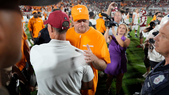 Oklahoma coach Brent Venables and Tennessee coach Josh Heupel meet after a college football game between the University of Oklahoma Sooners (OU) and the Tennessee Volunteers at Gaylord Family - Oklahoma Memorial Stadium in Norman, Okla., Saturday, Sept. 21, 2024. Oklahoma coach Brent Venables and Tennessee coach Josh Heupel meet after a college football game between the University of Oklahoma Sooners (OU) and the Tennessee Volunteers at Gaylord Family - Oklahoma Memorial Stadium in Norman, Okla., Saturday, Sept. 21, 2024.