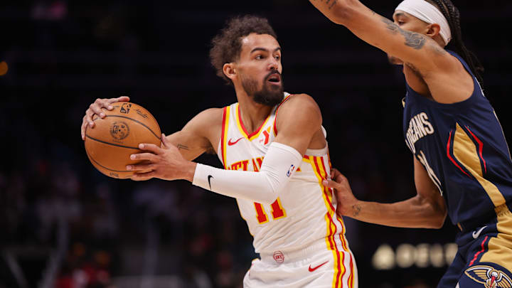 Dec 2, 2024; Atlanta, Georgia, USA; Atlanta Hawks guard Trae Young (11) looks to pass against the New Orleans Pelicans in the first quarter at State Farm Arena. Mandatory Credit: Brett Davis-Imagn Images
