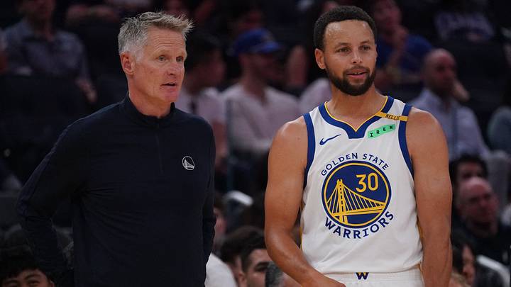 San Francisco, California, USA;  Golden State Warriors head coach Steve Kerr and guard Stephen Curry (30) talk during a break against the Portland Trail Blazers in the first quarter at Chase Center.  Mandatory Credit: David Gonzales-Imagn Images