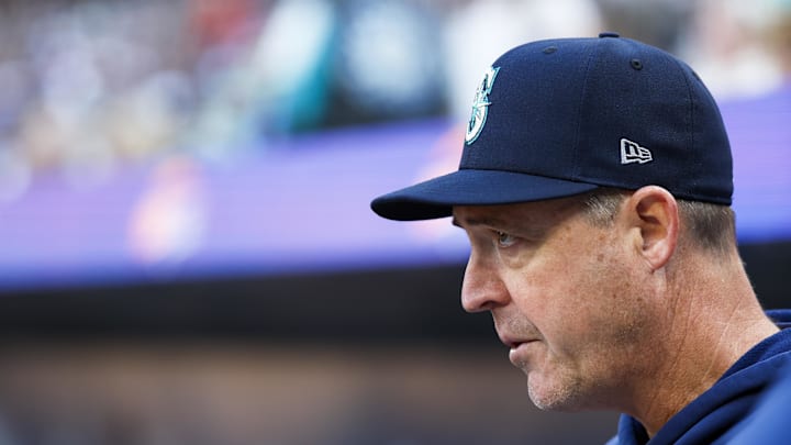Seattle Mariners manager Dan Wilson (6) stands in the dugout during the seventh inning against the New York Yankees at T-Mobile Park on Sept 19. Seattle Mariners manager Dan Wilson (6) stands in the dugout during the seventh inning against the New York Yankees at T-Mobile Park on Sept 19.