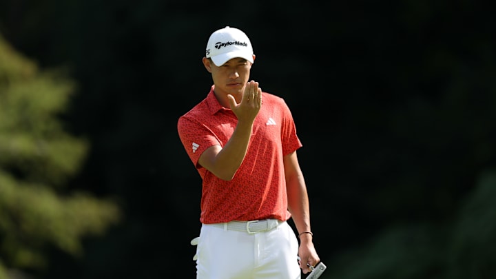 Collin Morikawa reading a putt at the Zozo Championship.
