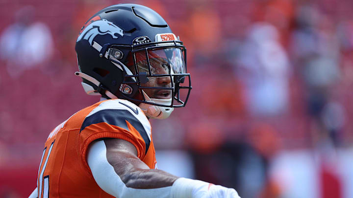 Sep 22, 2024; Tampa, Florida, USA;  Denver Broncos wide receiver Courtland Sutton (14) works out prior to the game against the Tampa Bay Buccaneers at Raymond James Stadium. Mandatory Credit: Kim Klement Neitzel-Imagn Images