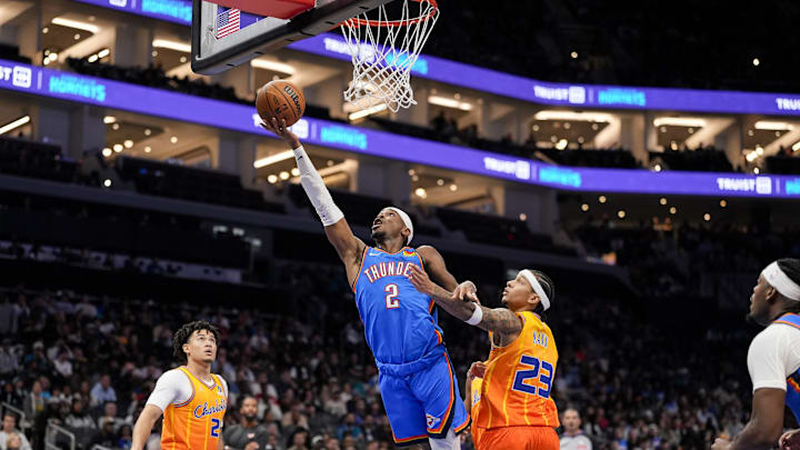 Nov 15, 2025; Charlotte, North Carolina, USA; Oklahoma City Thunder guard Shai Gilgeous-Alexander (2) drives to the basket against the Charlotte Hornets during the second half at Spectrum Center. Mandatory Credit: Jim Dedmon-Imagn Images