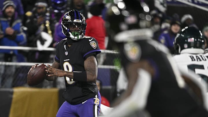Dec 1, 2024; Baltimore, Maryland, USA; Baltimore Ravens quarterback Lamar Jackson (8) throws from the end zone during the first half  
against the Philadelphia Eagles at M&T Bank Stadium. Mandatory Credit: Tommy Gilligan-Imagn Images