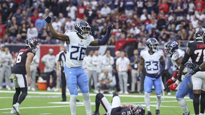Nov 24, 2024; Houston, Texas, USA; Tennessee Titans cornerback Justin Hardee Sr. (26) reacts after Houston Texans place kicker Ka'imi Fairbairn (15) misses a field goal during the fourth quarter at NRG Stadium. Mandatory Credit: Troy Taormina-Imagn Images