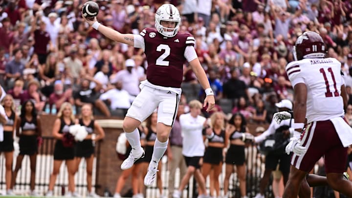Aug 31, 2024; Starkville, Mississippi, USA; Mississippi State Bulldogs quarterback Blake Shapen (2) jumps into the endzone against Eastern Kentucky Colonels linebacker Maddox Marcellus (11) during the first quarter at Davis Wade Stadium at Scott Field. Mandatory Credit: Matt Bush-USA TODAY Sports