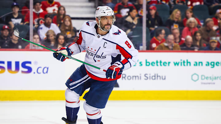 Mar 18, 2024; Calgary, Alberta, CAN; Washington Capitals left wing Alex Ovechkin (8) skates against the Calgary Flames during the first period at Scotiabank Saddledome. Mandatory Credit: Sergei Belski-Imagn Images
