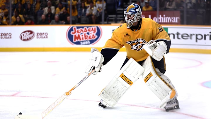 Oct 26, 2024; Nashville, Tennessee, USA; Nashville Predators goaltender Scott Wedgewood (41) taps a puck back in play against the Columbus Blue Jackets in the second period at Bridgestone Arena. Mandatory Credit: Casey Gower-Imagn Images