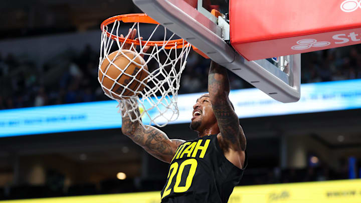 Oct 10, 2024; Dallas, Texas, USA;  Utah Jazz forward John Collins (20) dunks during the second half against the Dallas Mavericks at American Airlines Center. Mandatory Credit: Kevin Jairaj-Imagn Images