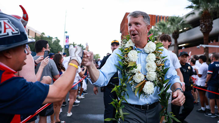Aug 31, 2024; Tucson, Arizona, USA; Arizona Wildcats head coach Brent Brennan walks down the Wildcat Walk interacting with fans before the game at Arizona Stadium. Mandatory Credit: Aryanna Frank-Imagn Images Aug 31, 2024; Tucson, Arizona, USA; Arizona Wildcats head coach Brent Brennan walks down the Wildcat Walk interacting with fans before the game at Arizona Stadium. Mandatory Credit: Aryanna Frank-Imagn Images