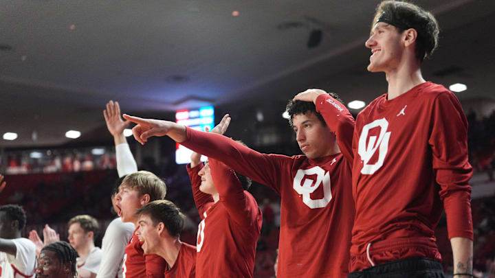 The Oklahoma bench celebrates a basket in the second half of the menÕs college basketball game between the University of Oklahoma Sooners and Ole Miss at Lloyd Noble Center in Norman, Okla., Saturday Jan. 3, 2026.