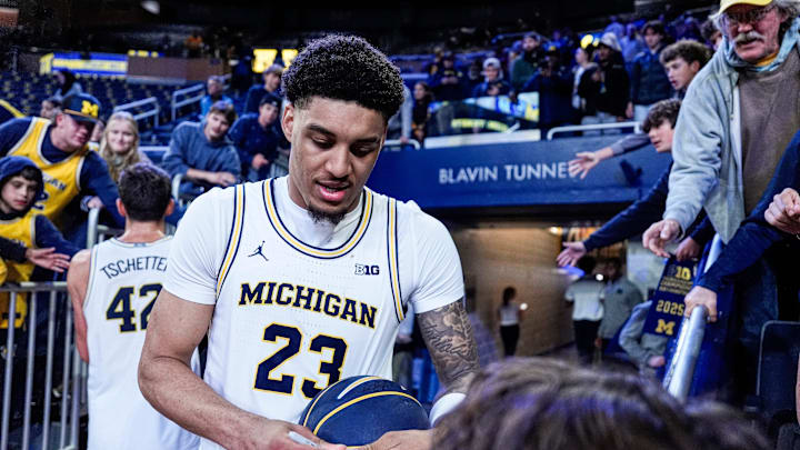 Michigan forward Yaxel Lendeborg (23) sign autographs for fans after 121-78 win over Oakland at Crisler Center in Ann Arbor on Monday, November 3, 2025. Michigan forward Yaxel Lendeborg (23) sign autographs for fans after 121-78 win over Oakland at Crisler Center in Ann Arbor on Monday, November 3, 2025.
