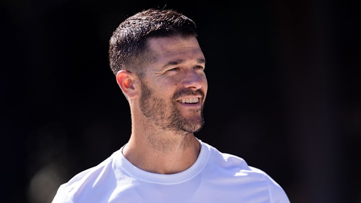 Jul 23, 2025; Charlotte, NC, USA; Carolina Panthers Head Coach Dave Canales walks to the field for Panthers Training Camp.  Mandatory Credit: Scott Kinser-Imagn Images