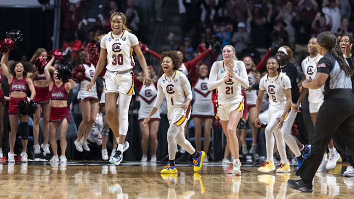 Mar 30, 2025; Birmingham, AL, USA; South Carolina Gamecocks forward Maryam Dauda (30) and South Carolina Gamecocks guard Maddy McDaniel (1) and South Carolina Gamecocks forward Chloe Kitts (21) lead their team onto the floor to celebrate after the South Carolina Gamecocks defeated the Duke Blue Devils at an Elite 8 NCAA Tournament basketball game at Legacy Arena. Mandatory Credit: Vasha Hunt-Imagn Images