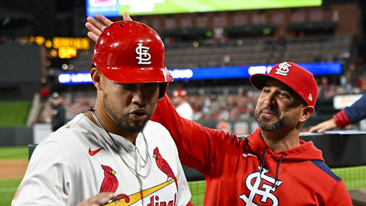 Apr 14, 2025; St. Louis, Missouri, USA;  St. Louis Cardinals first baseman Willson Contreras (40) is congratulated by manager Oliver Marmol (37) after he scored against the Houston Astros during the fifth inning at Busch Stadium. Mandatory Credit: Jeff Curry-Imagn Images