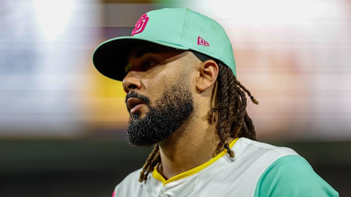 Aug 22, 2025; San Diego, California, USA; San Diego Padres right fielder Fernando Tatis Jr. (23) walks off the field during the sixth inning against the Los Angeles Dodgers at Petco Park. Mandatory Credit: David Frerker-Imagn Images