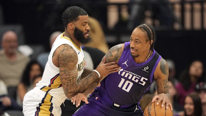 Apr 3, 2026; Sacramento, California, USA; Sacramento Kings guard DeMar DeRozan (10) dribbles against New Orleans Pelicans guard Saddiq Bey (left) during the first quarter at Golden 1 Center.