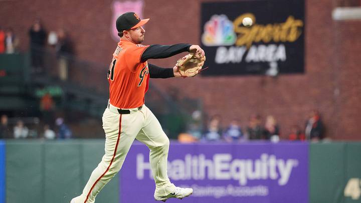 San Francisco, California, USA; San Francisco Giants infielder Buddy Kennedy (41) throws the ball to first base to force out Colorado Rockies infielder Willi Castro (not pictured) during the first inning at Oracle Park. Mandatory Credit: Robert Edwards-Imagn Images San Francisco, California, USA; San Francisco Giants infielder Buddy Kennedy (41) throws the ball to first base to force out Colorado Rockies infielder Willi Castro (not pictured) during the first inning at Oracle Park. Mandatory Credit: Robert Edwards-Imagn Images