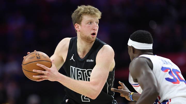 Mar 14, 2026; Philadelphia, Pennsylvania, USA; Brooklyn Nets forward Danny Wolf (2) controls the ball against Philadelphia 76ers center Adem Bona (30) during the second quarter at Xfinity Mobile Arena. Mandatory Credit: Bill Streicher-Imagn Images