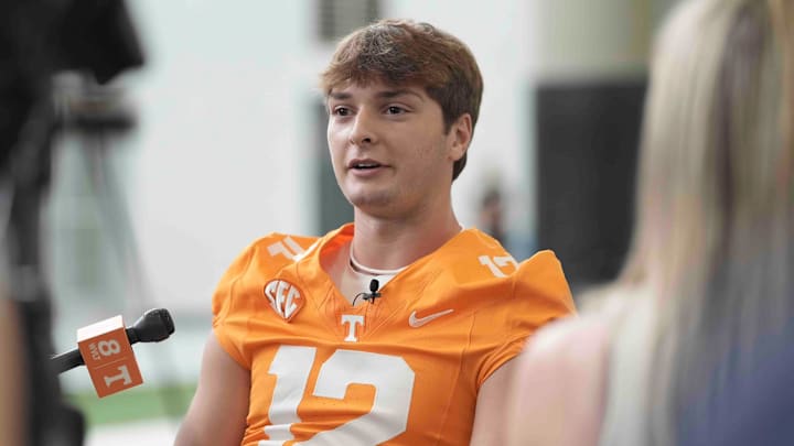 Tennessee quarterback Jake Merklinger (12) speaks to the media during football media day, in Knoxville, Tennessee, July 29, 2025.