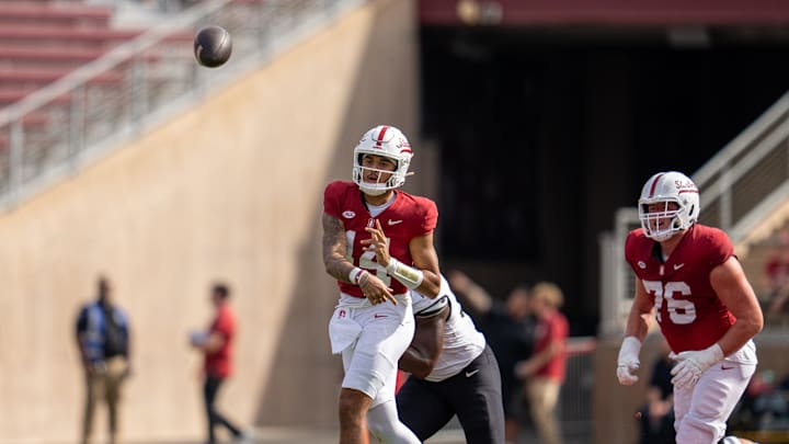 Oct 26, 2024; Stanford, California, USA;  Stanford Cardinal quarterback Ashton Daniels (14) passes the football against the Wake Forest Demon Deacons during the second quarter at Stanford Stadium. Mandatory Credit: Neville E. Guard-Imagn Images