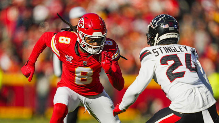 Dec 21, 2024; Kansas City, Missouri, USA; Kansas City Chiefs wide receiver DeAndre Hopkins (8) runs against Houston Texans cornerback Derek Stingley Jr. (24) during the first half at GEHA Field at Arrowhead Stadium. Mandatory Credit: Jay Biggerstaff-Imagn Images
