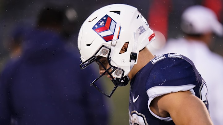 Sep 23, 2023; East Hartford, Connecticut, USA; UConn Huskies running back Victor Rosa (22) on the sideline as they take on the Duke Blue Devils in the second half at Rentschler Field at Pratt & Whitney Stadium. Mandatory Credit: David Butler II-Imagn Images