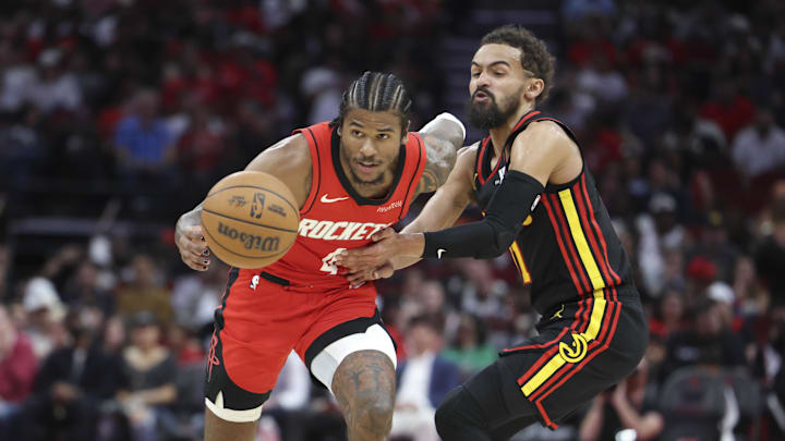 Mar 25, 2025; Houston, Texas, USA; Houston Rockets guard Jalen Green (4) attempts to control the ball away from Atlanta Hawks guard Trae Young (11) during the second quarter at Toyota Center. Mandatory Credit: Troy Taormina-Imagn Images Mar 25, 2025; Houston, Texas, USA; Houston Rockets guard Jalen Green (4) attempts to control the ball away from Atlanta Hawks guard Trae Young (11) during the second quarter at Toyota Center. Mandatory Credit: Troy Taormina-Imagn Images