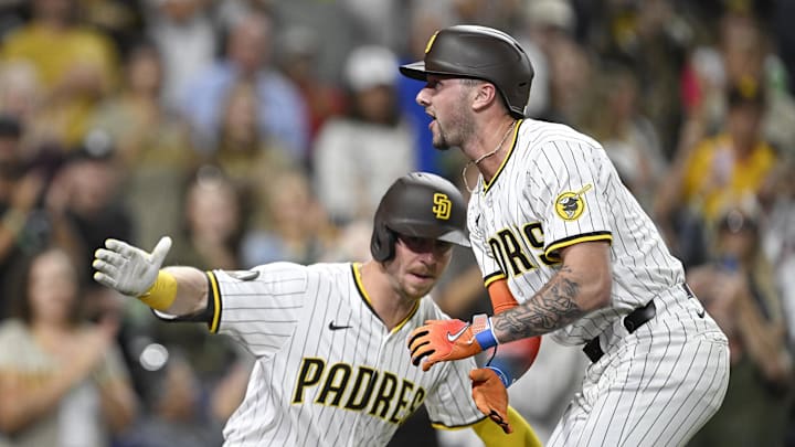 San Diego Padres center fielder Jackson Merrill (3) is congratulated by  Ryan O'Hearn (32) after hitting a solo home run during the fourth inning against the Colorado Rockies at Petco Park on Sept. 11.