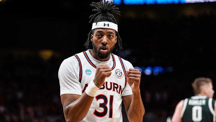Auburn forward Chaney Johnson (31) celebrates a play against Michigan State during the first half of the Elite Eight round of NCAA tournament at State Farm Arena in Atlanta, Ga. on Sunday, March 30, 2025.