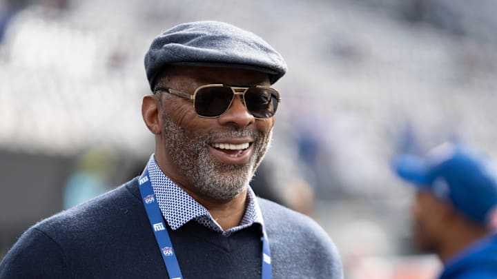Retired New York Giants player Carl Banks stands on the sideline prior to the start of the game between New York Giants and Indianapolis Colts at MetLife Stadium on Sunday, Dec. 29, 2024.