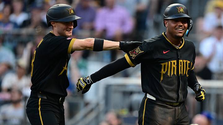 Aug 14, 2026; Pittsburgh, Pennsylvania, USA; Pittsburgh Pirates right fielder Esmerlyn Valdez (55) is congratulated by center fielder Jake Mangum (28) after scoring a run during the fourth inning against the Boston Red Sox at PNC Park. Mandatory Credit: David Dermer-Imagn Images