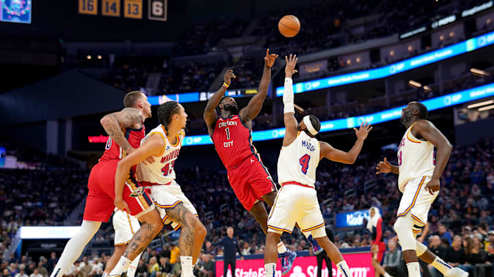 Oct 29, 2024; San Francisco, California, USA; New Orleans Pelicans forward Zion Williamson (1) shoots over Golden State Warriors guard Moses Moody (4) in the third quarter at the Chase Center. Mandatory Credit: Cary Edmondson-Imagn Images