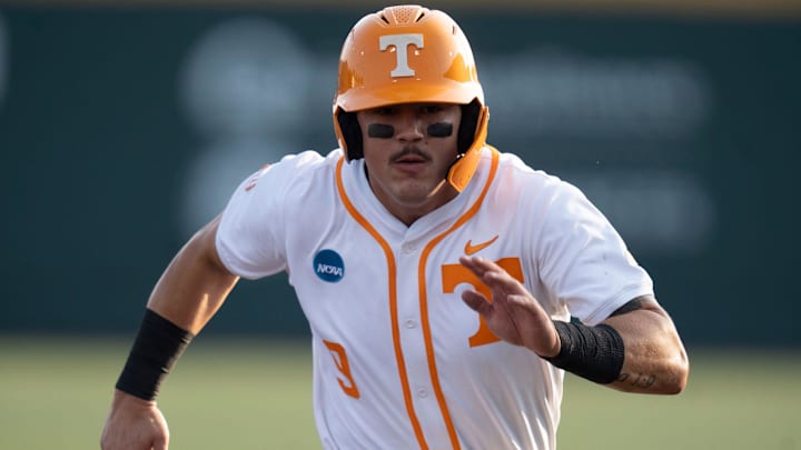 Tennessee's Hunter Ensley (9) runs to third base during the NCAA college baseball Knoxville Regional final against Wake Forest on June 2, 2025, in Knoxville, Tenn. Tennessee's Hunter Ensley (9) runs to third base during the NCAA college baseball Knoxville Regional final against Wake Forest on June 2, 2025, in Knoxville, Tenn.