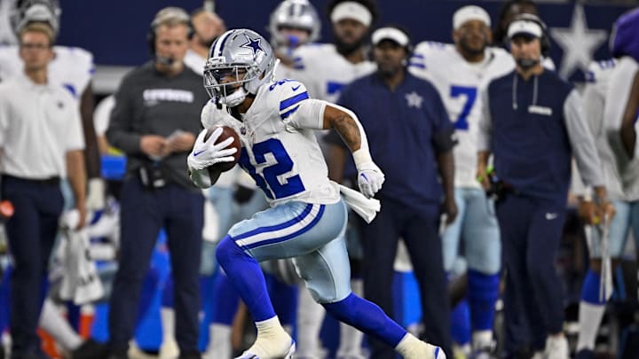 Aug 16, 2025; Arlington, Texas, USA; Dallas Cowboys running back Deuce Vaughn (42) runs with the ball during the game between the Dallas Cowboys and the Baltimore Ravens at AT&T Stadium. Mandatory Credit: Jerome Miron-Imagn Images